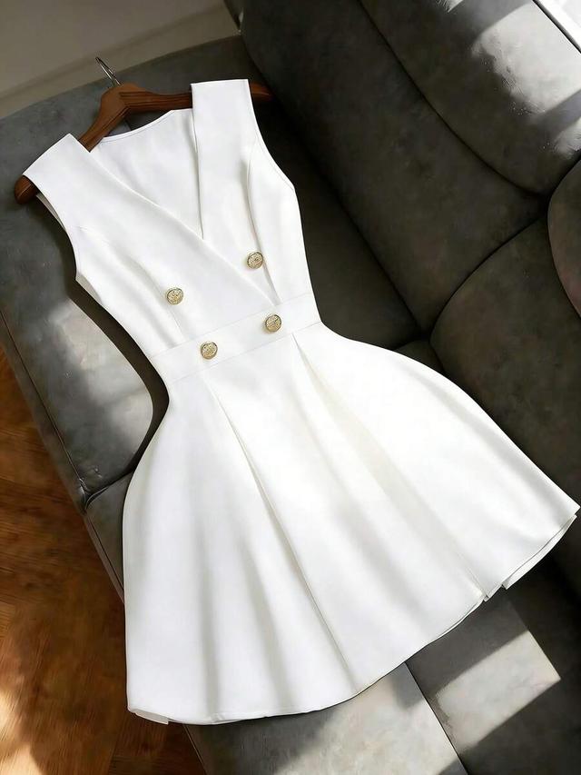 white sleeveless double-breasted blazer dress