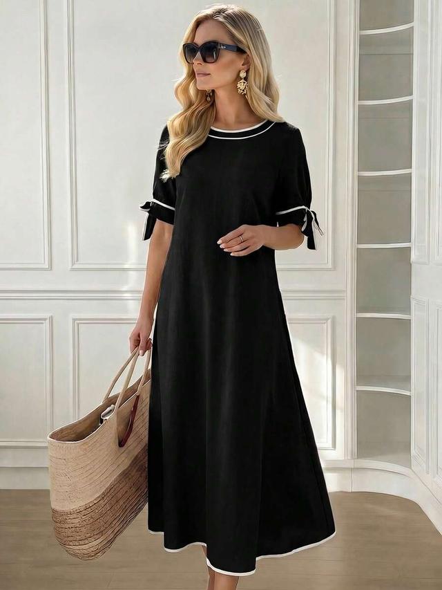 black round neck long dress with bow cuff detail