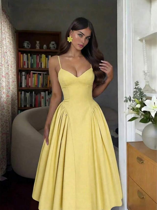 yellow structured midi dress with corset bodice