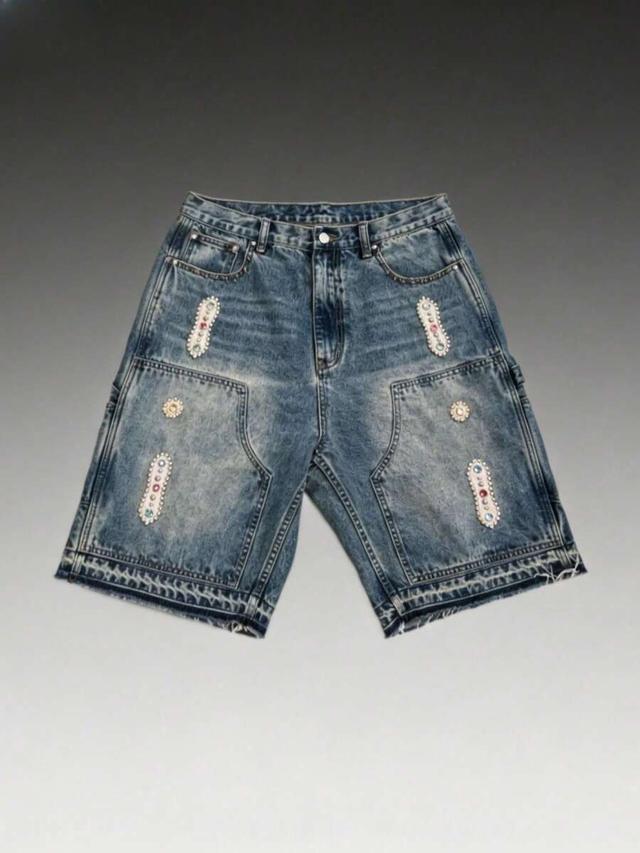 distressed washed denim shorts with rhinestone embellishments