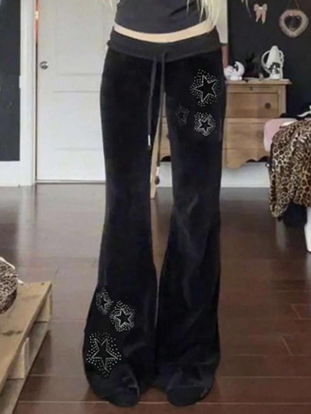 black velvet flare pants with rhinestone star decor