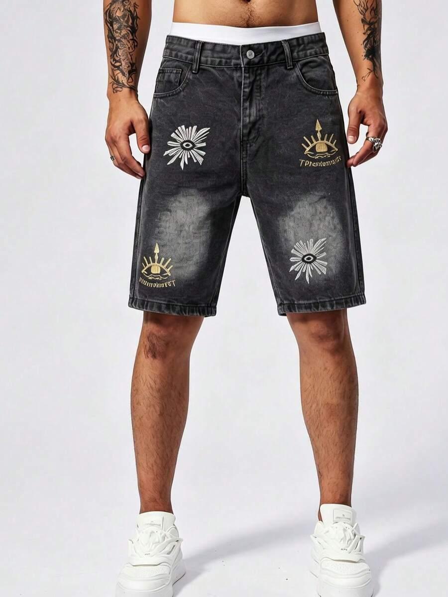 men's black denim shorts with embroidered eye motifs