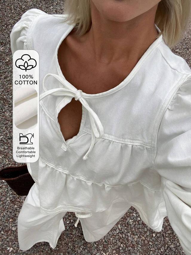 white cotton puff sleeve peplum top