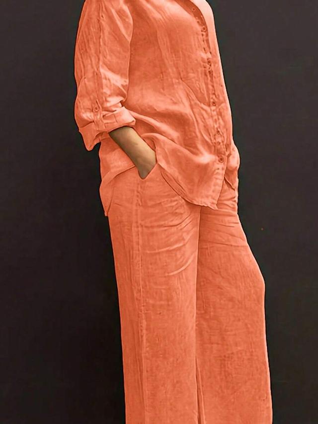 orange linen button-up shirt and wide-leg trousers set