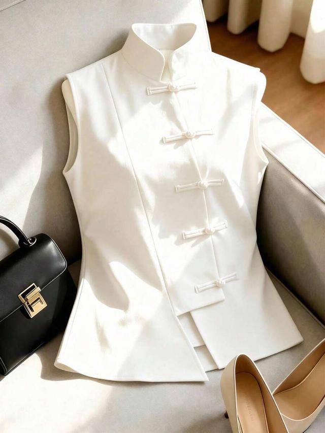 white sleeveless cheongsam inspired stand collar button top
