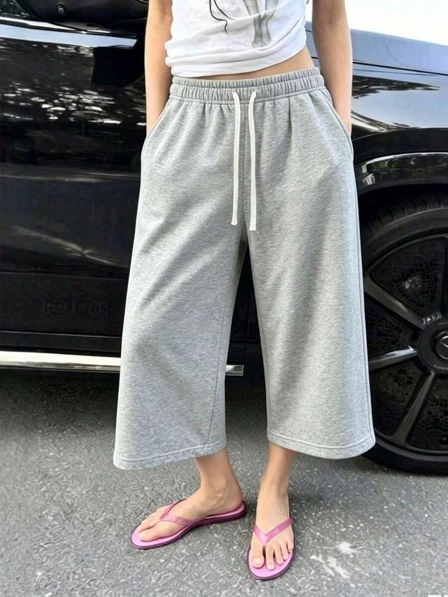 grey loose mid-length drawstring lounge shorts