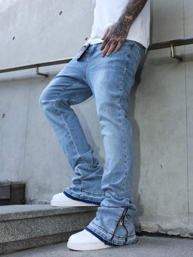 light wash wide leg flare denim jeans with zippers