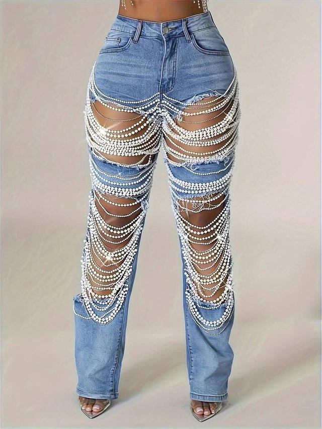 high-waisted distressed denim jeans with pearl chain embellishments