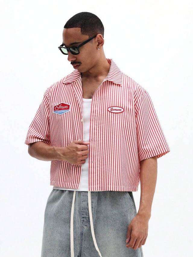 red and white vertical striped short sleeve shirt