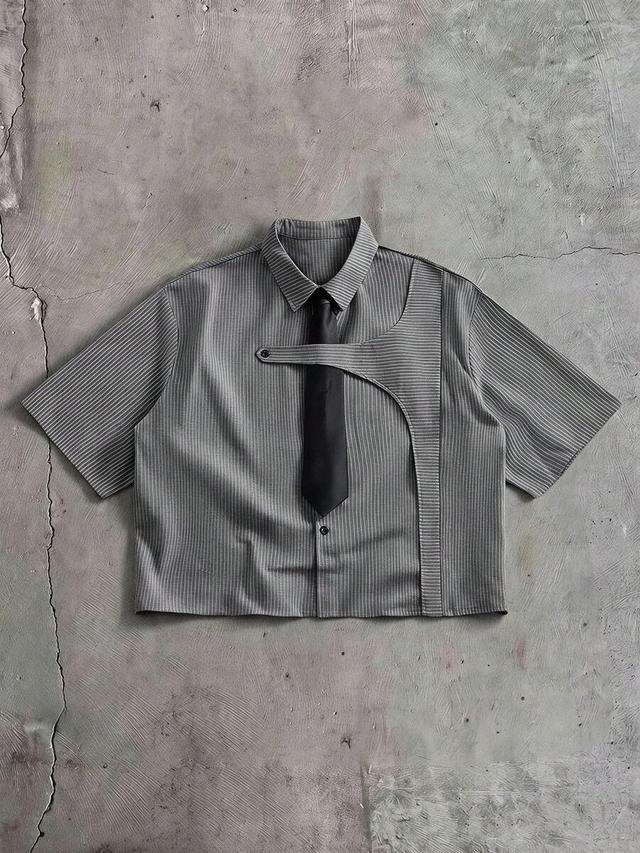 grey pinstripe short-sleeved shirt with asymmetric strap detail
