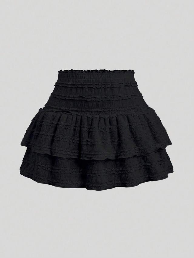 black textured fabric ruffle hem mini skirt