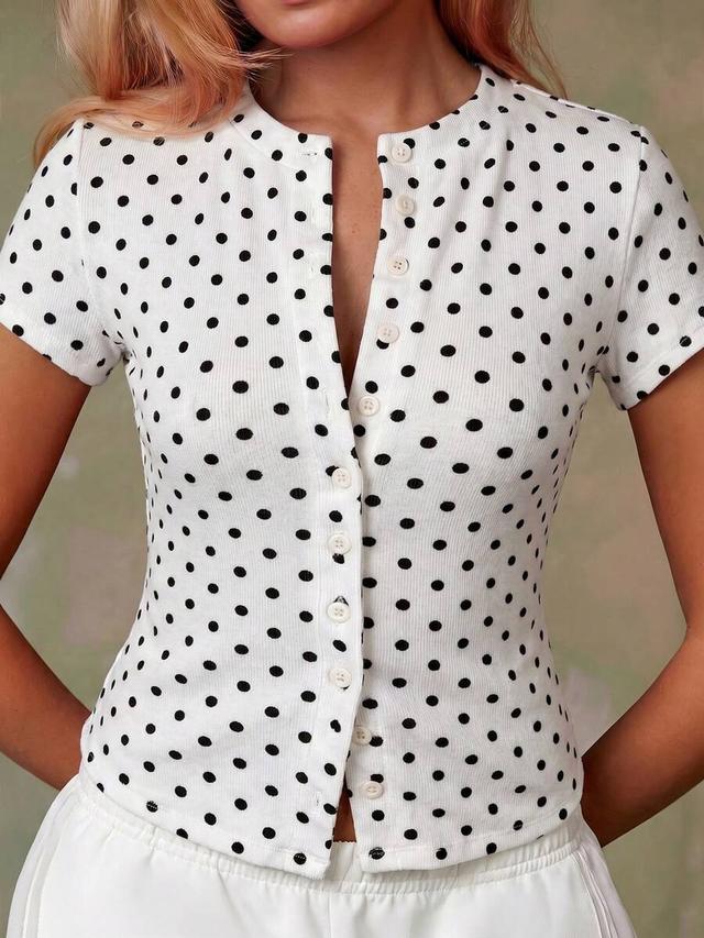 white with black polka dot short sleeve button top