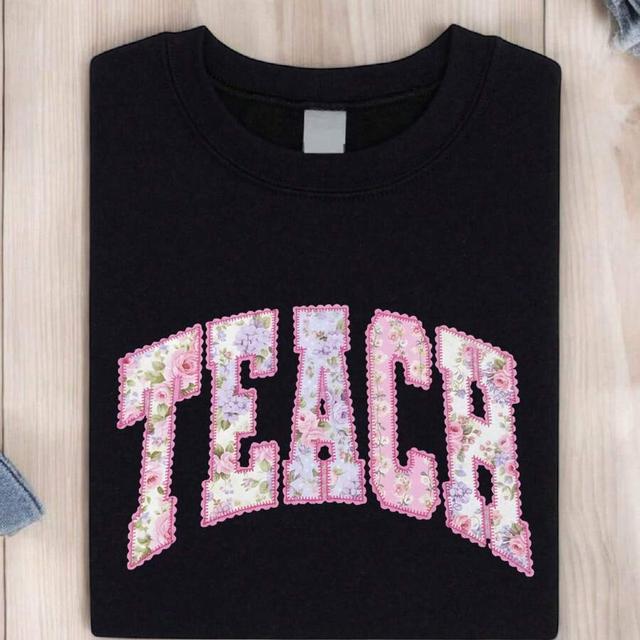 black floral cotton t-shirt with floral applique teach lettering