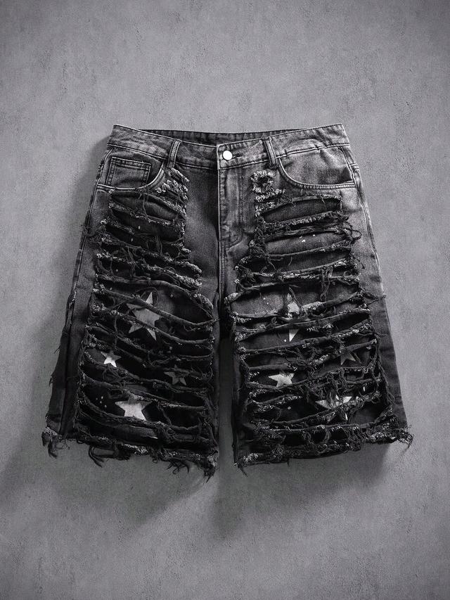 distressed black denim shorts with star print