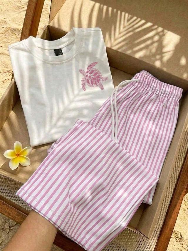 white embroidered turtle round neck short sleeve top