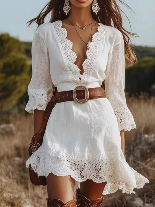 white cotton mini dress with intricate lace trim