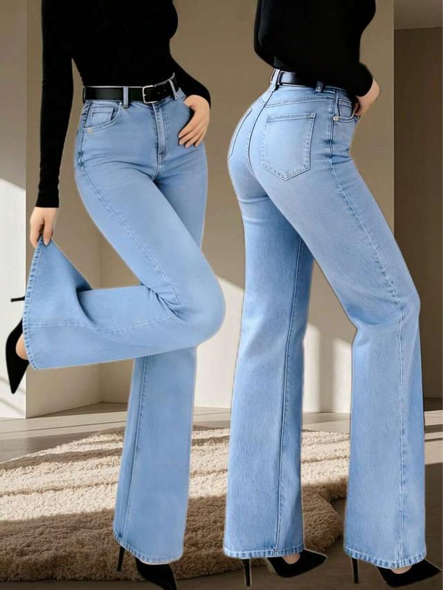 blue high waisted flared denim jeans
