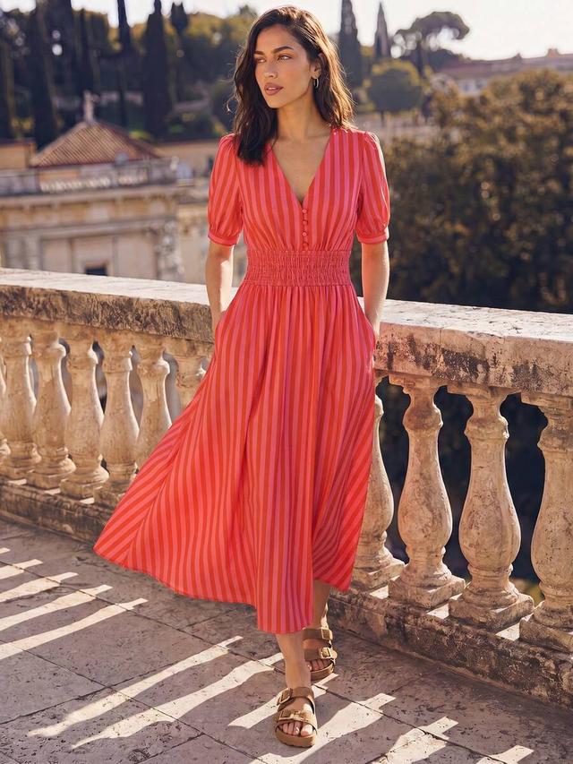 red and pink striped midi dress with smocked waist