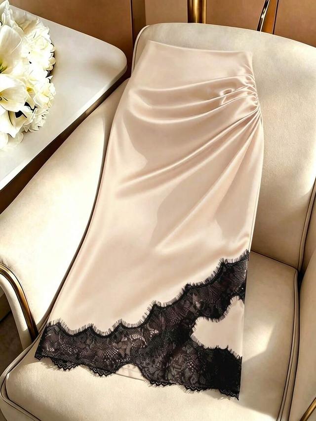 beige satin midi skirt with black lace trim