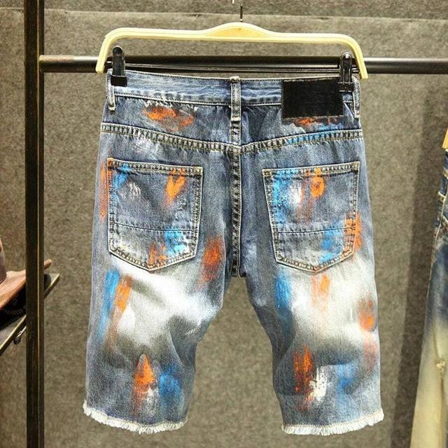 distressed paint splatter denim shorts
