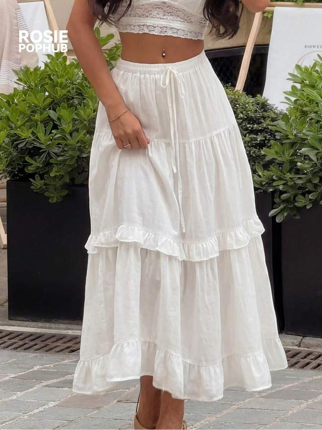 white long ruffle hem maxi skirt
