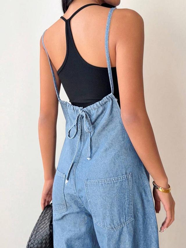 light wash denim dungaree jumpsuit with tie back
