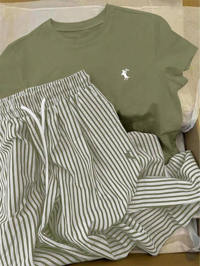 olive green round neck embroidered top and striped pants