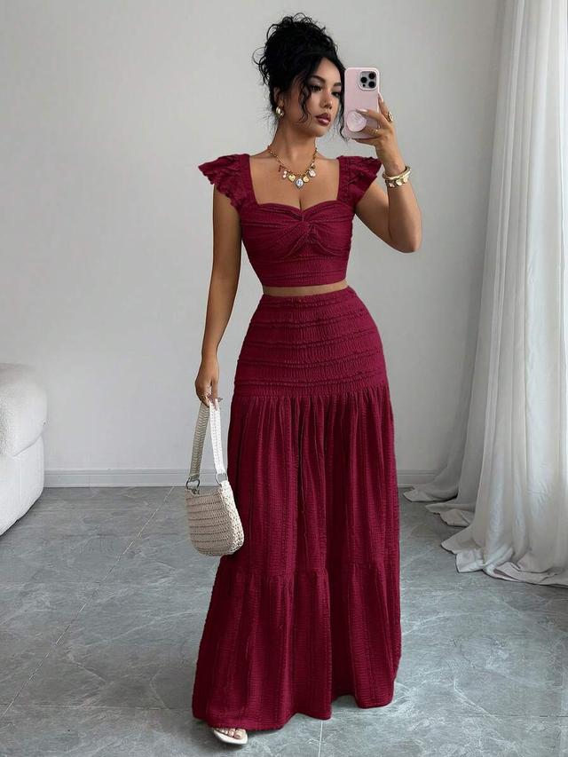 burgundy twisted knot crop top and smocked maxi skirt