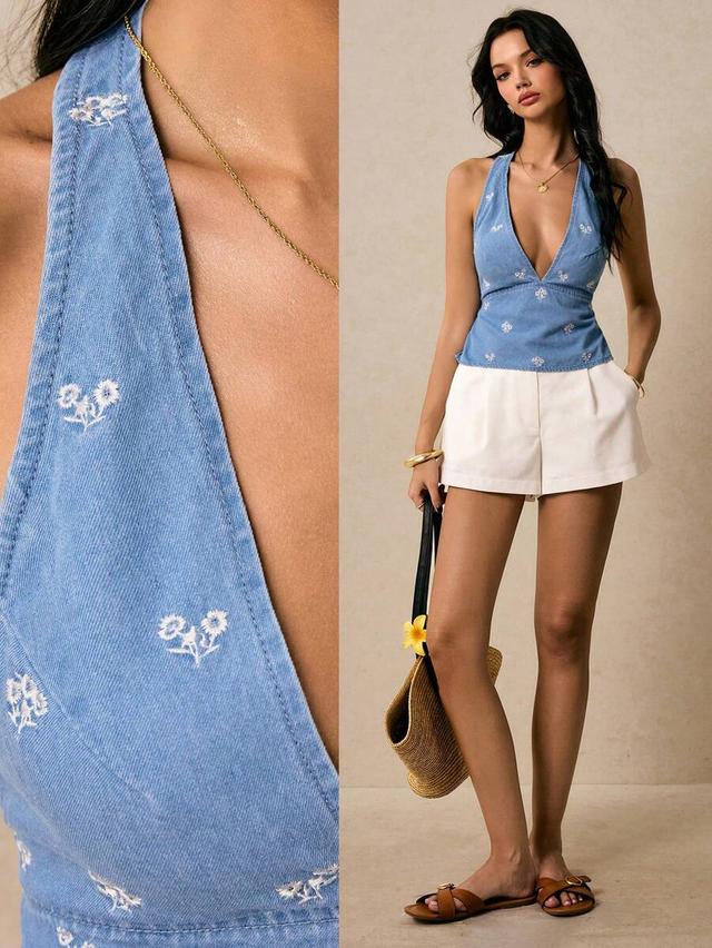 blue denim halter top with white floral embroidery