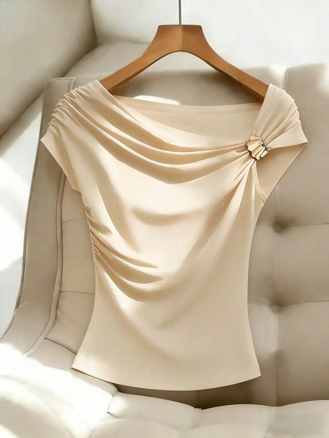 beige draped metal twist accent top