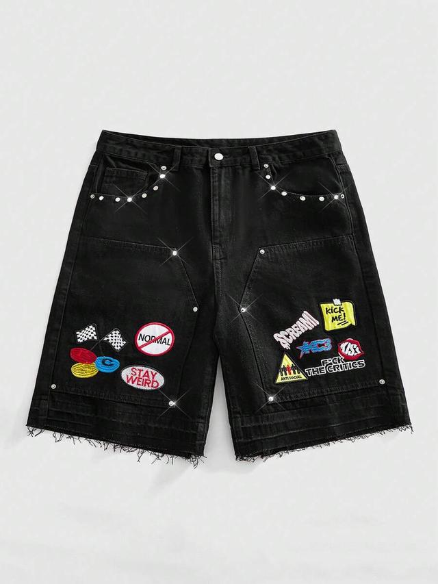 black denim shorts with embroidered patches and studs