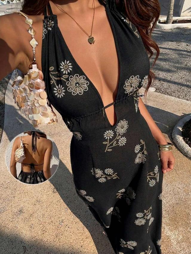 black halter neck dress with floral embroidery