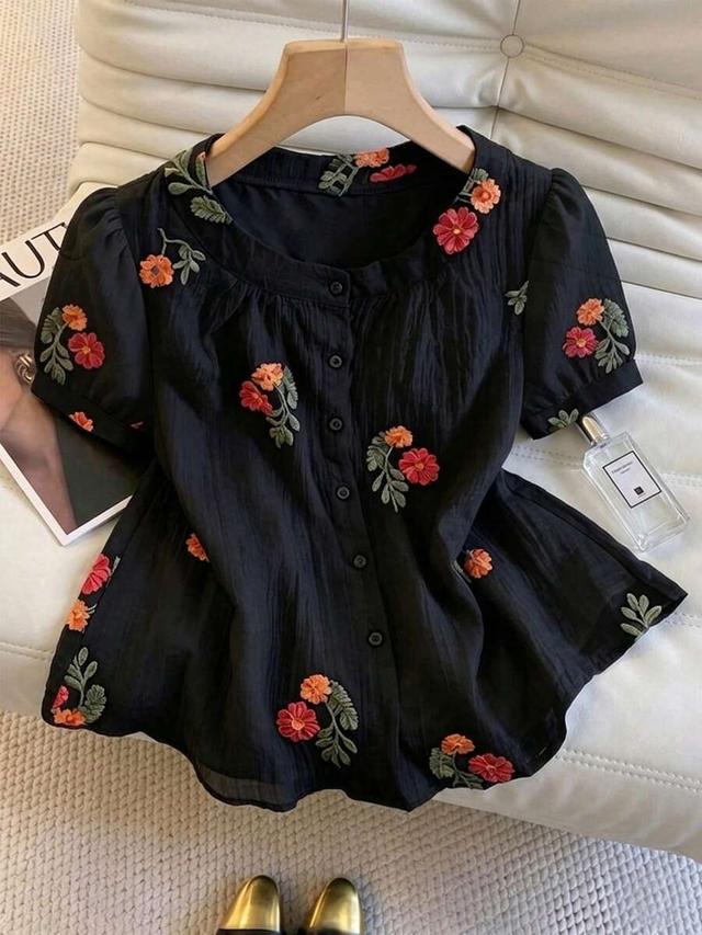 black textured floral embroidered round neck blouse