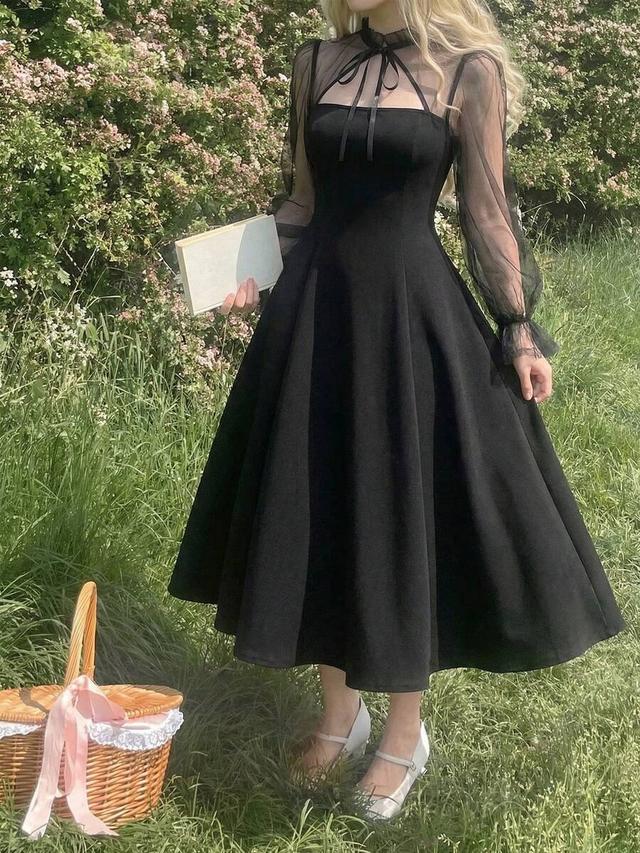 black midi dress with sheer mesh flare sleeves