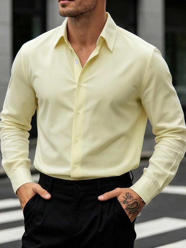 pale yellow long sleeve button-up dress shirt