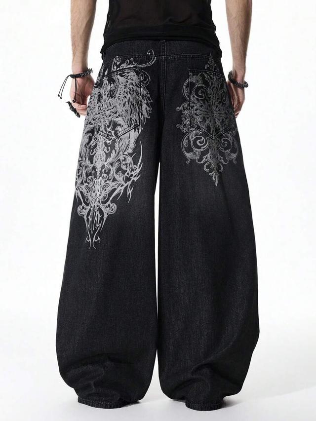 black wide-leg denim jeans with graphic print
