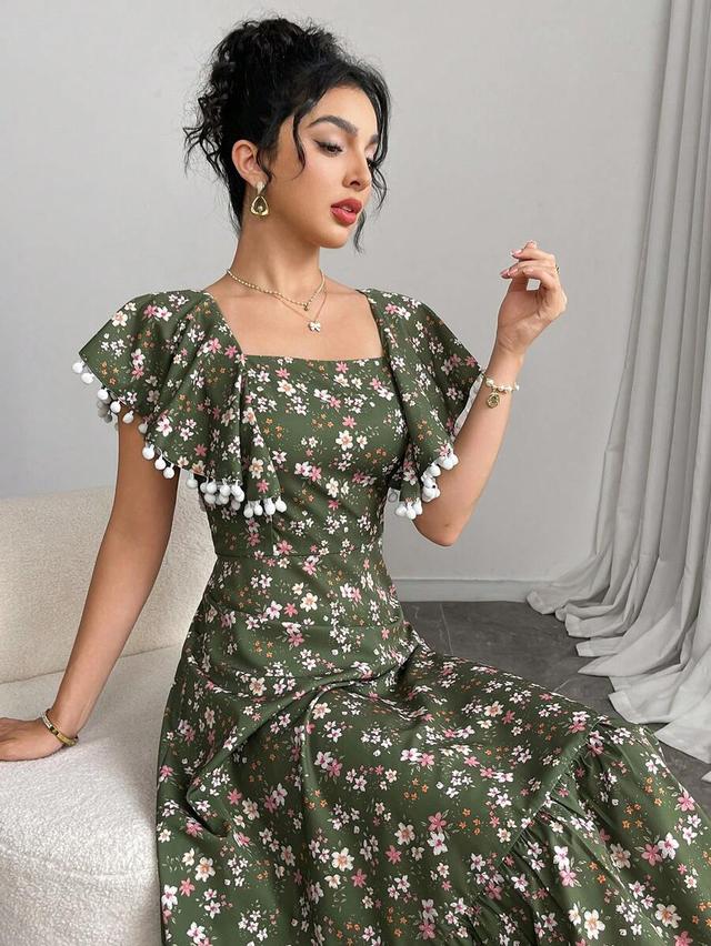 green ditsy floral ruffled midi dress with pom-poms