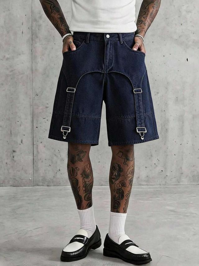 washed blue denim shorts with decorative strap detailing