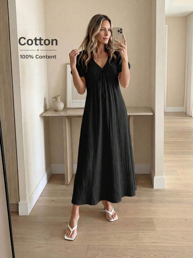 black textured cotton midi dress with tie neck