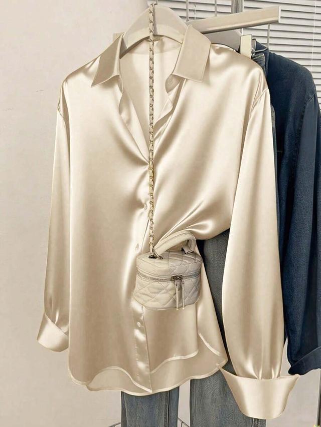 white women's champagne satin button down shirt
