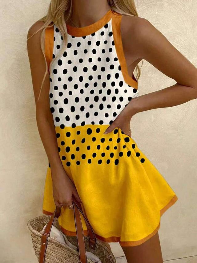 yellow and white polka dot sleeveless shift dress