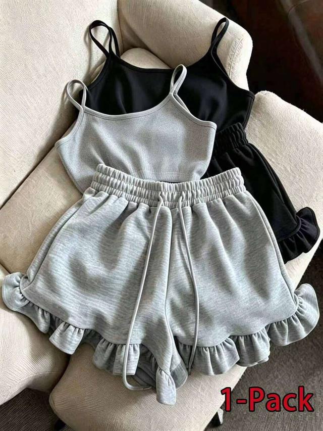 black camisole tank top and ruffle shorts set