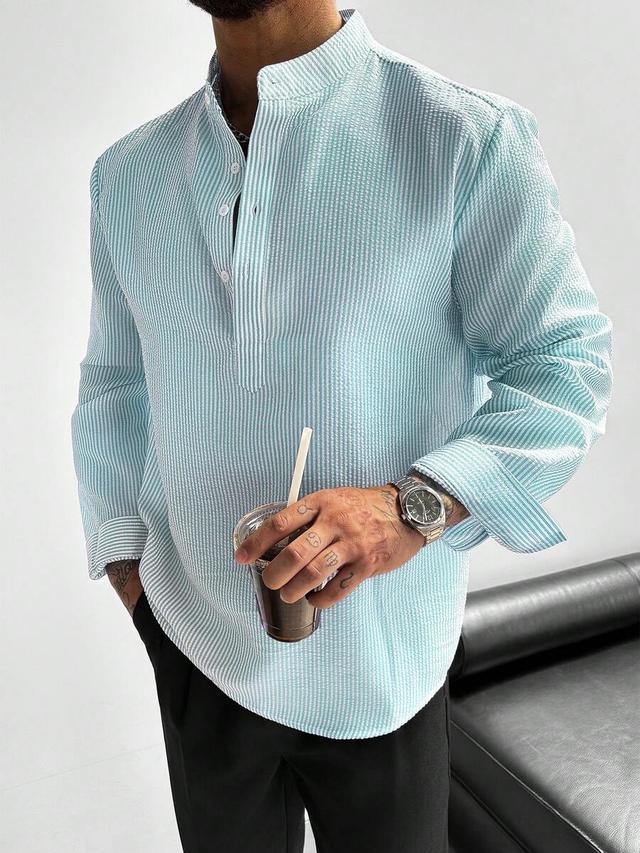 light blue striped seersucker half-placket stand collar shirt