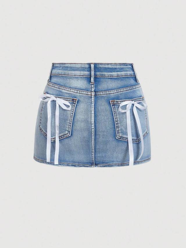 light wash denim mini skirt with ribbon bow details