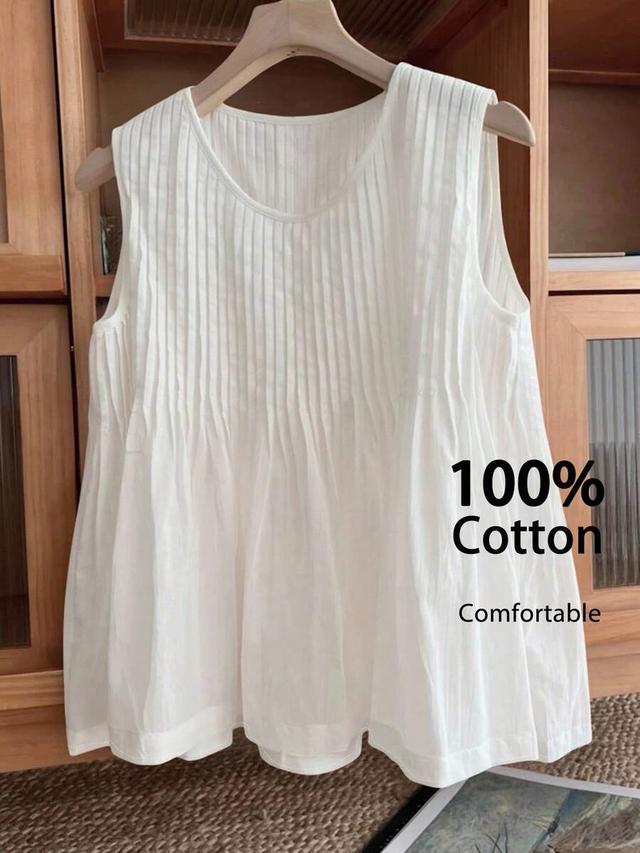 minimalist white cotton pleated sleeveless blouse