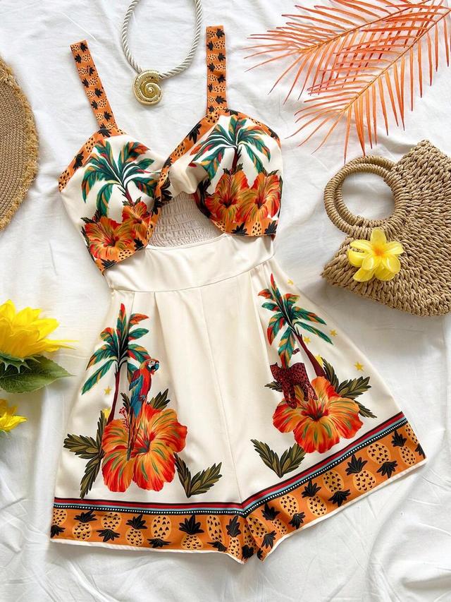 tropical print cutout playsuit with hibiscus and pineapple motifs