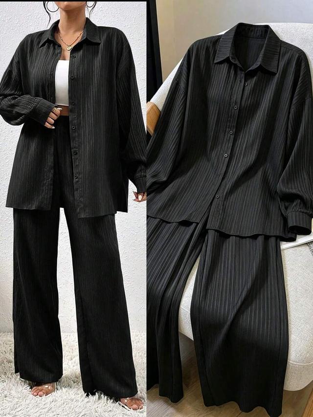 black textured drop shoulder shirt and wide leg pants set