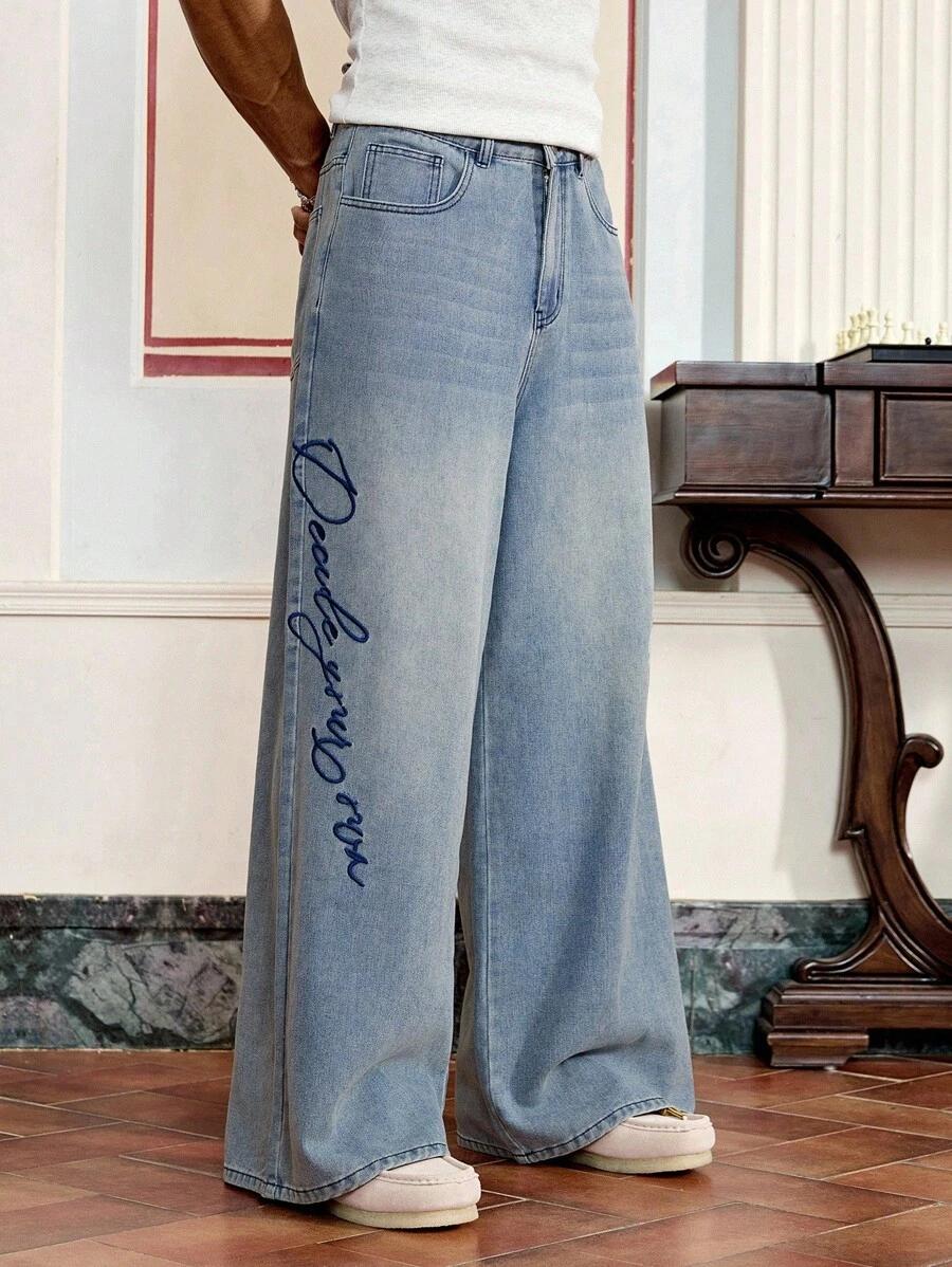 washed light blue embroidered wide leg denim jeans