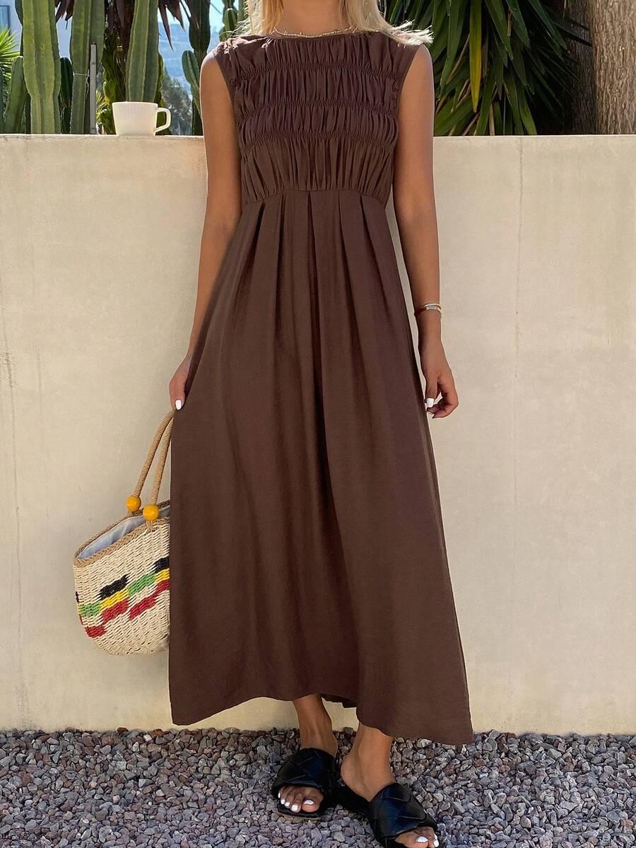 brown sleeveless midi dress with smocked bodice