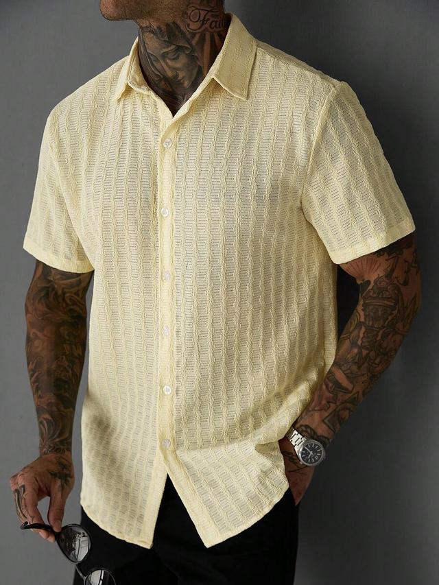 light yellow textured short sleeve button down shirt
